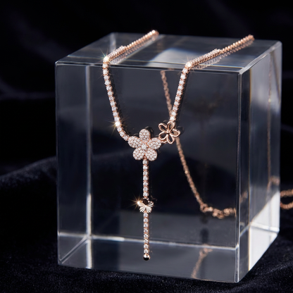 Floral Drop Lariat Necklace with Cascading Charm Design